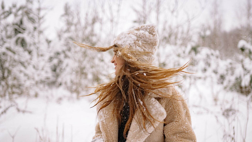 woman with hair in snow