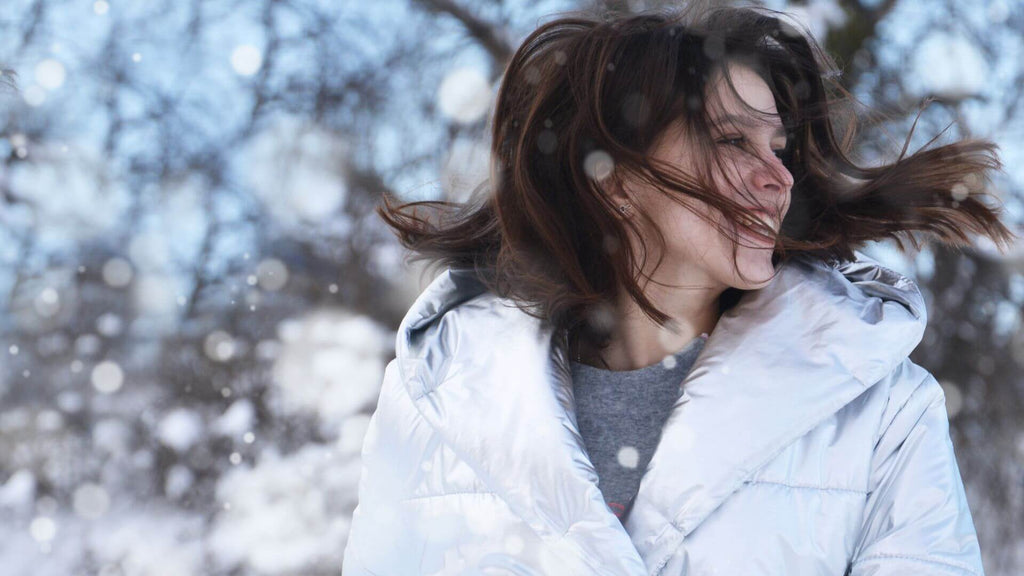 woman with hair in snow