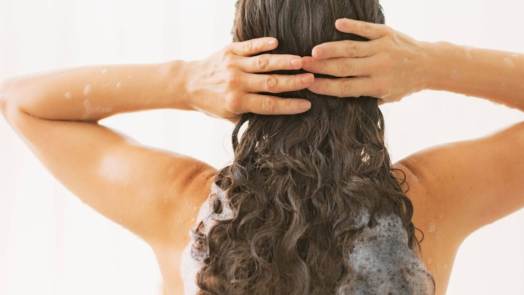 woman with long wavy brunette hair