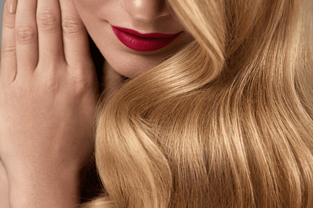 woman with blonde hair red lips