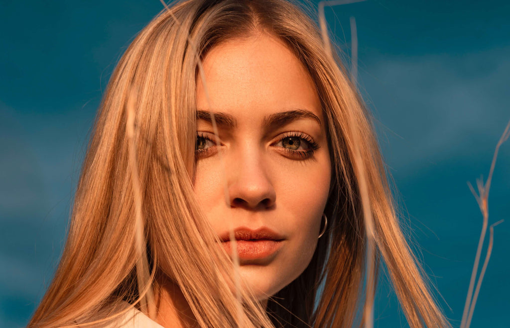 blonde hair woman in sun