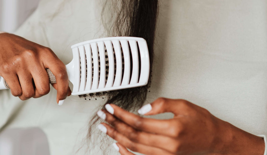 woman brushing hair