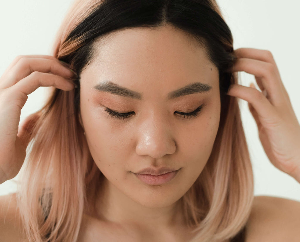 woman with dark pink ombre hair