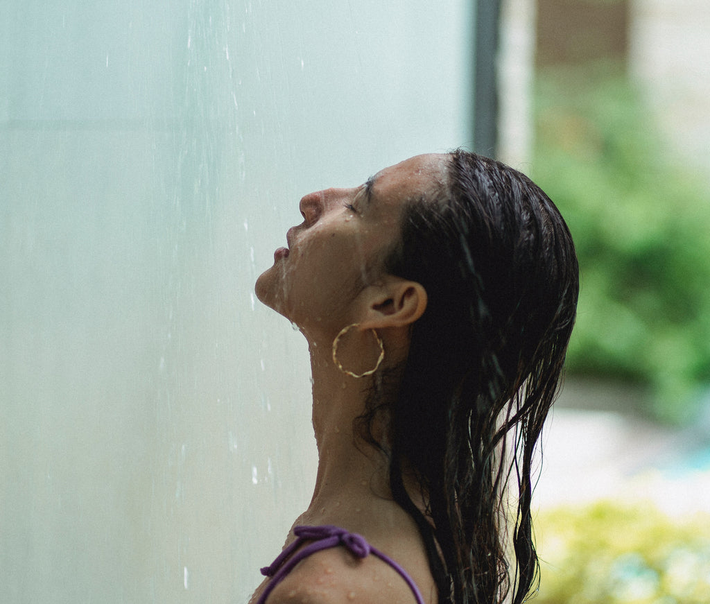 brunette woman in shower