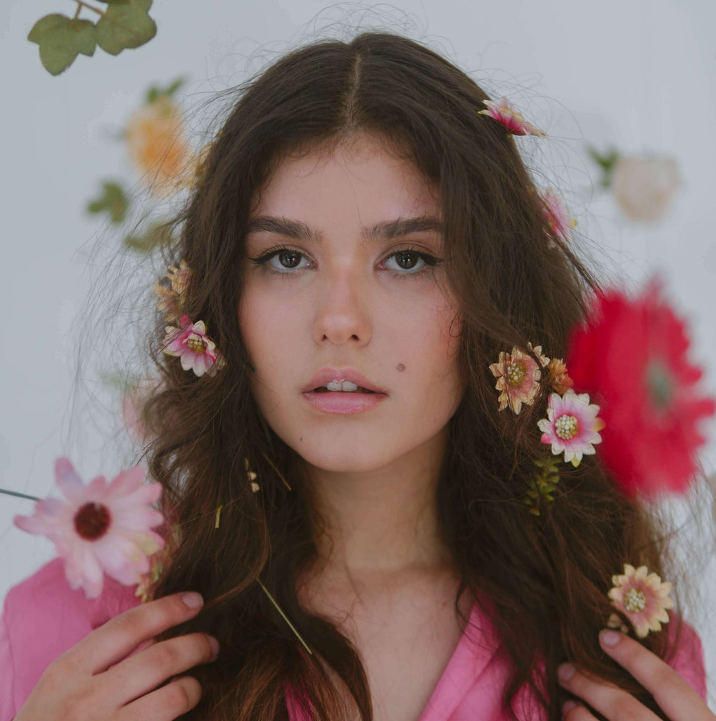 woman with flowers in hair