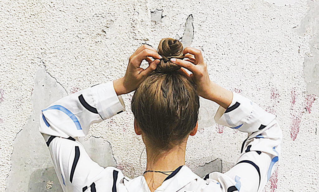 blonde woman hair bun