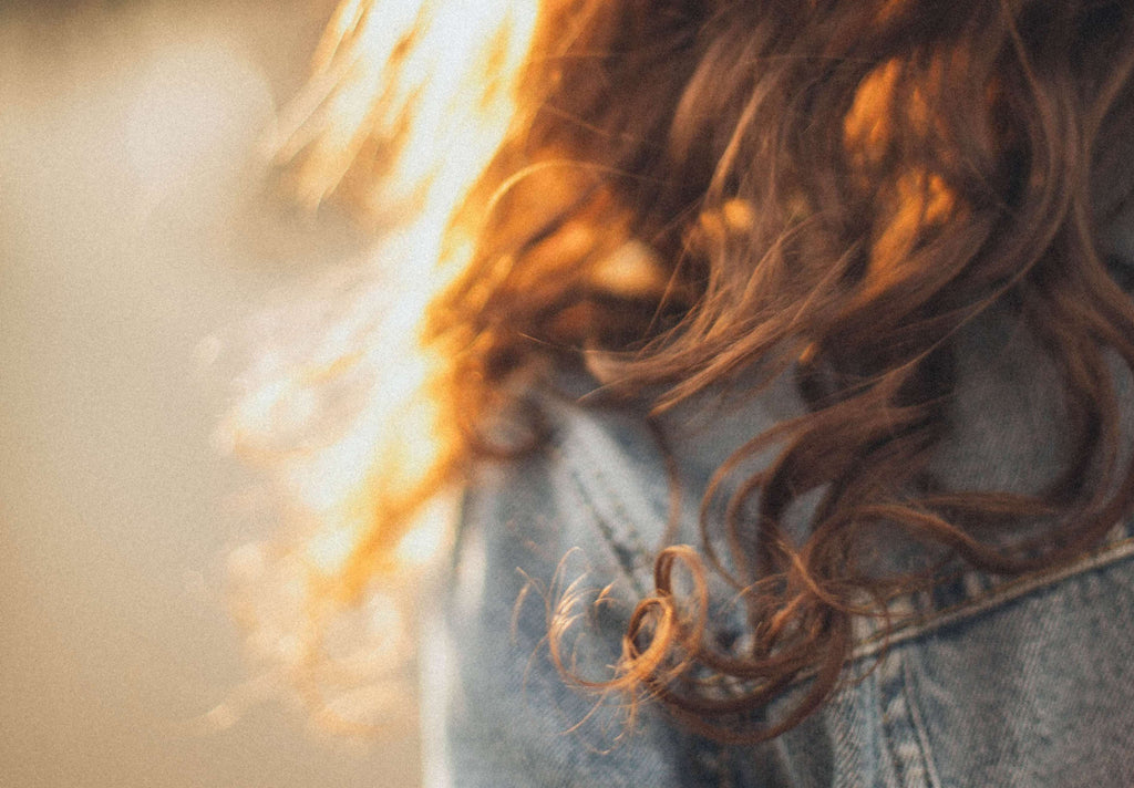 brunette hair with curl 