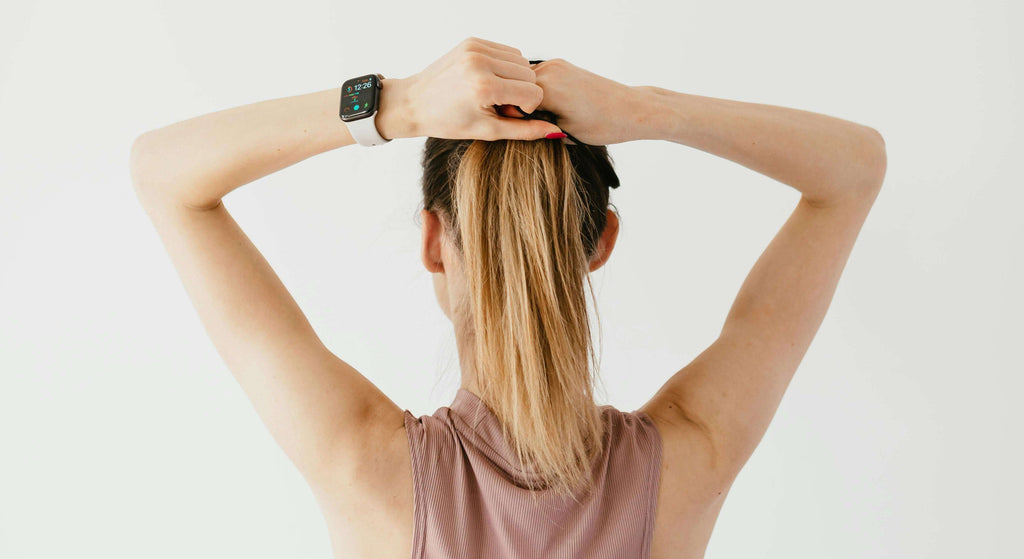 woman with blonde hair in ponytail