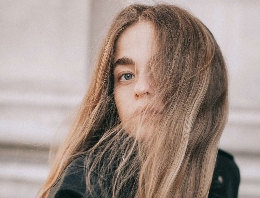 woman with long hair in face