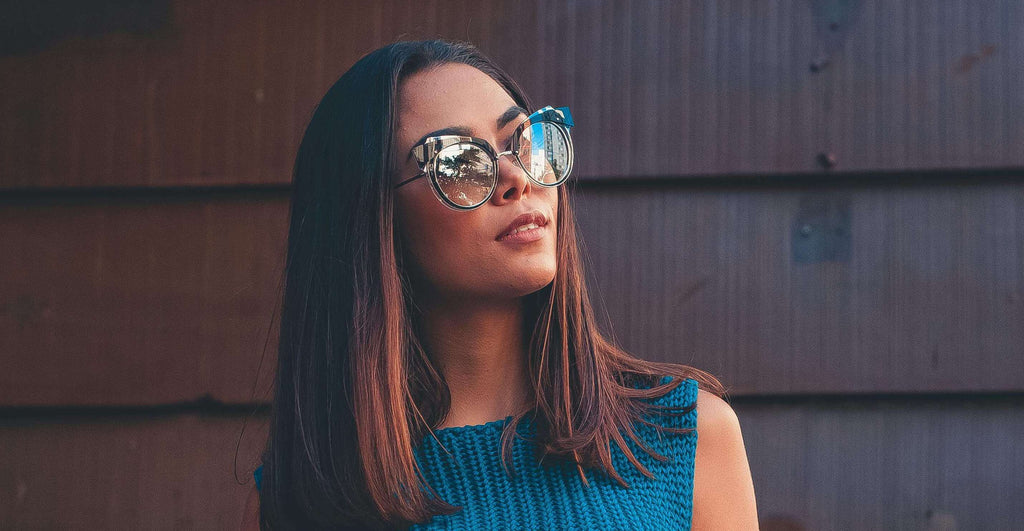 woman with short brown hair glasses