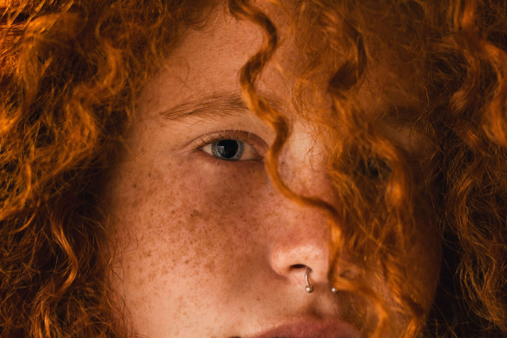 woman with red curly hair