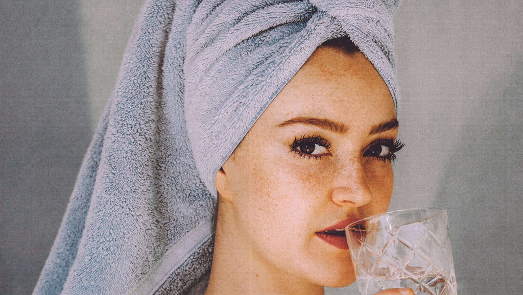 woman with towel on head