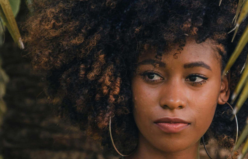 woman with curly coily hair