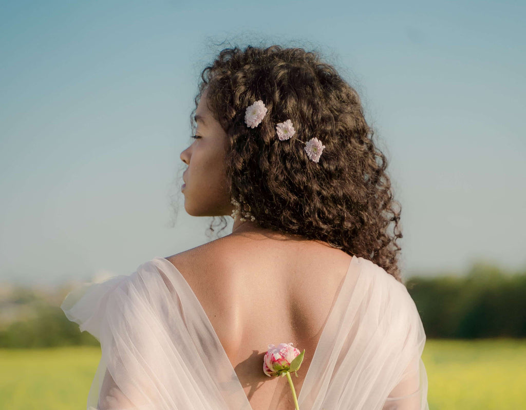 woman with flowers in hair