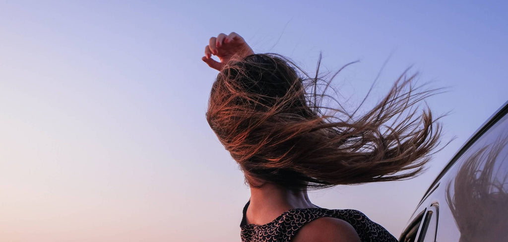 long hair sunset woman