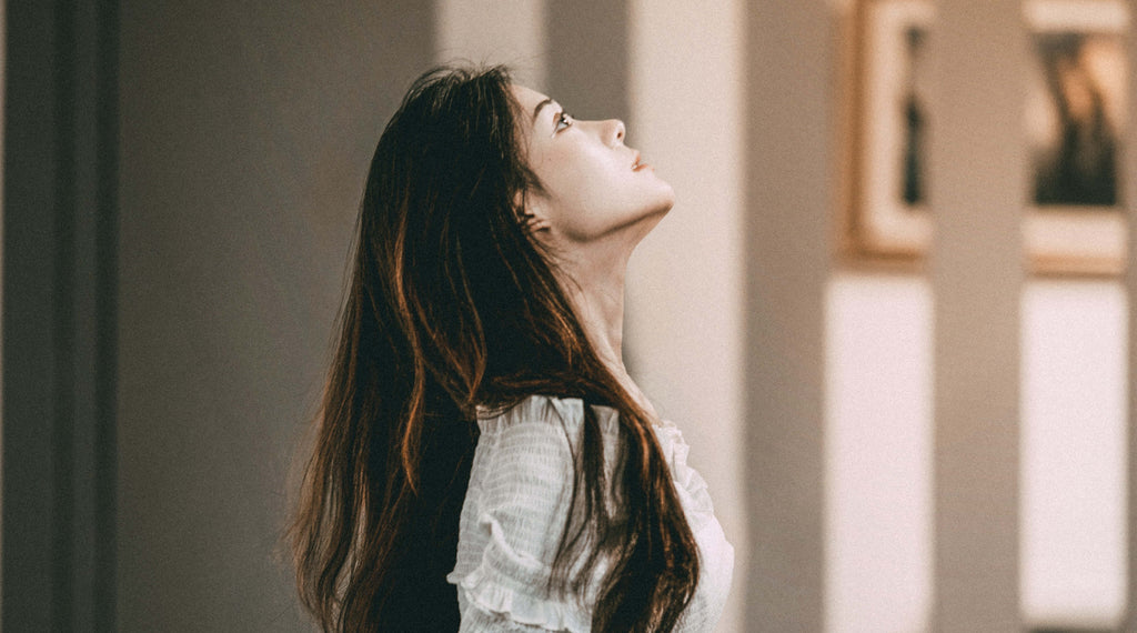 woman looking up type two hair